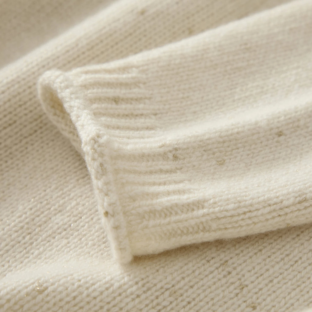 Pull en pur cachemire pour femme, mi-long, ample et décontracté, grand modèle à ourlet retroussé.