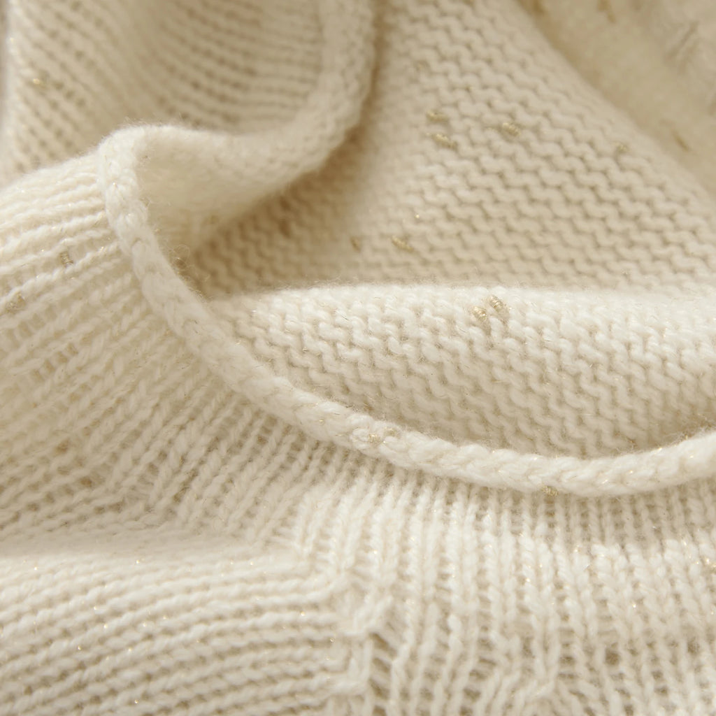 Pull en pur cachemire pour femme, mi-long, ample et décontracté, grand modèle à ourlet retroussé.